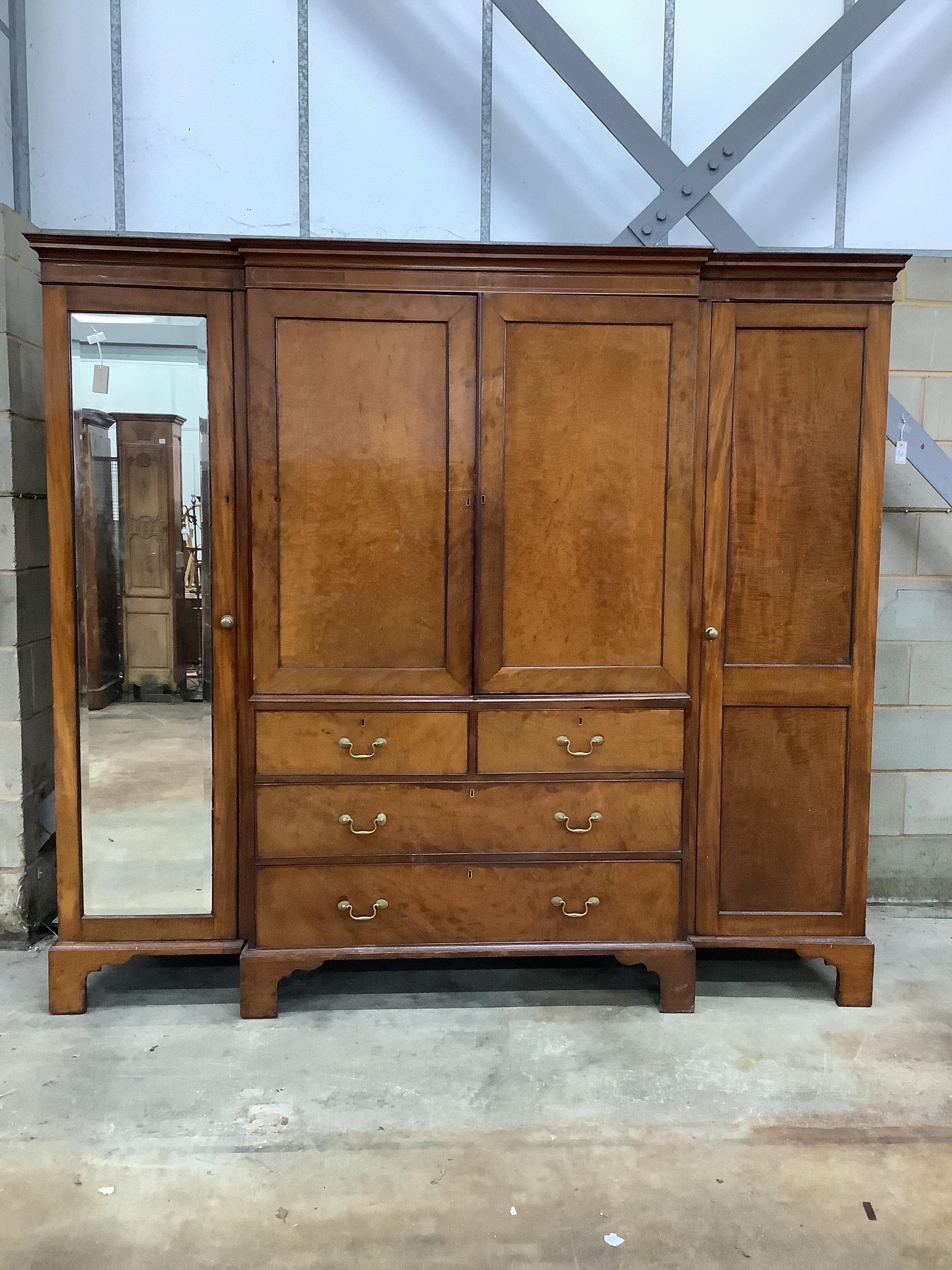 A 19th century and later mahogany breakfront wardrobe with linen press centre section, width 224cm, depth 60cm, height 207cm